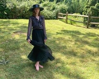 Top: Jerri Sherman, black and white polka dot, ruffled, chiffon blouse. Bottom: Katherine Dianos, ankle length full pleated skirt. 