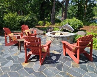 4 red Adirondack chairs and pillows