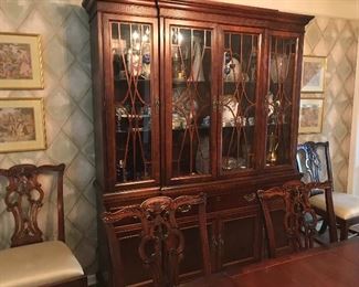 Mahogany Chippendale China Cabinet with drawers and Doors for Storage and has light.
