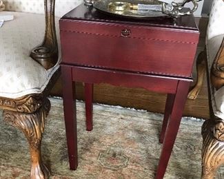 Love this little one piece table/chest. Note the hammered silver w gold birdsMichael Aram serving plate.