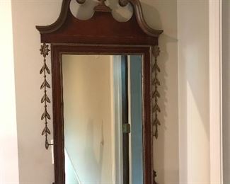 Another beautiful mirror with metal embellishments
