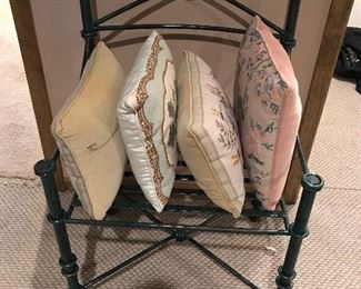 Love this little Iron chair. Great looking little pillows
