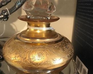 Love this gold embossed perfume bottle