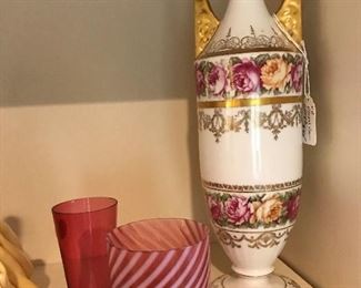 Beautiful hand painted vessel. Swirl cranberry glass