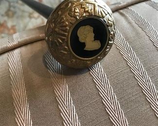 Wonderful Bridges brass cane with cameo