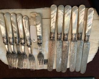 Mother of Pearl desert knives and forks with keeping pouch.