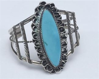 27. Turquoise and Silver Metal Native American Bracelet