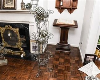 96. Wrought Iron Three Tier Plant Stand and Carpet Balls