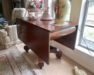 Awesome Drop Leaf Table with Heavy Pedestal Base on Wheels