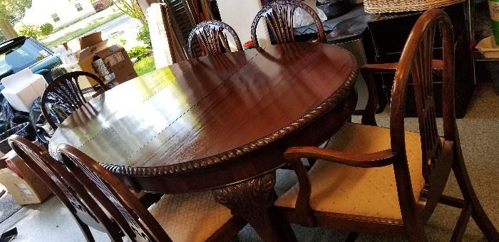 Dining table and six chairs from England