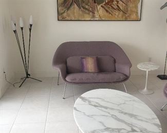 Knoll Brand Saarinen Womb Settee Couches, there are 3 total

Knoll  Marble Coffee Table 54” and 2 Oval 23” Side Tables
