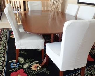 DINING TABLE WITH 6 - CHAIRS AND 2 LEAVES TO MAKE THIS A GREAT FAMILY TABLE