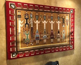 Exceptional Navajo hand woven processed wool rug in the Yei'ibichai dancer pattern with corn bug girl and boy.  73x48.  Gallup 1995 blue ribbon winner.  Approx. nine warp and forty-eight weft threads per inch.  Woven by Marie Brown Shirley. $4,000.00