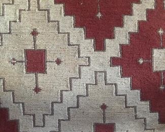 Close up of Dhurrie Rug in great room.