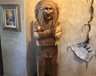 Say hi to this handsome six foot tall carved wood cigar store Indian.   Lots of detail and carved on both sides. 