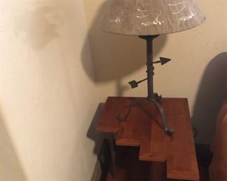 There are two of these custom made mesquite end tables with wrought iron bases.  This is one of many fun table lamps.