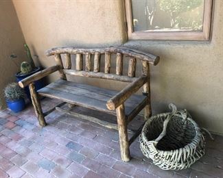 We have several rustic benches and lots of potted plants.