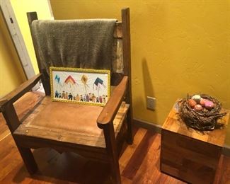 We have a mesquite, cowhide and leather large armchair and a cute cubic mahogany accent table.