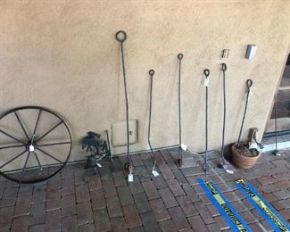 Branding irons and wagon wheels, lot of both!