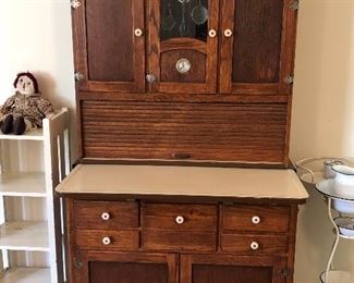Unique antique Hoosier cupboard. We can’t find a brand name on this one!