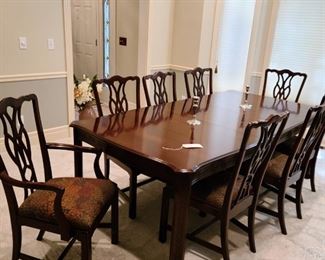 Harden Chippendale black cherry table w/2 leaves and 8 side chairs and 2 captain chairs, table pads and credenza $2,500
