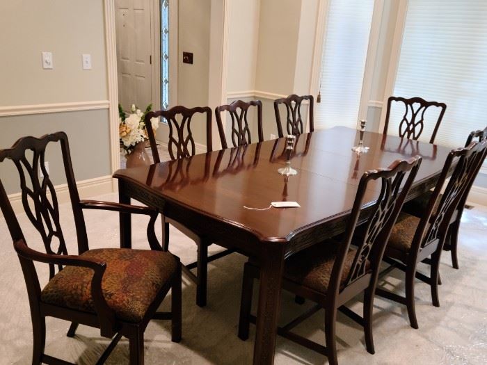 Harden Chippendale black cherry table w/2 leaves and 8 side chairs and 2 captain chairs, table pads and credenza $2,500