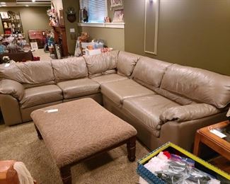 Craftwork Guild Ltd sectional with hide a bed on one end. $800