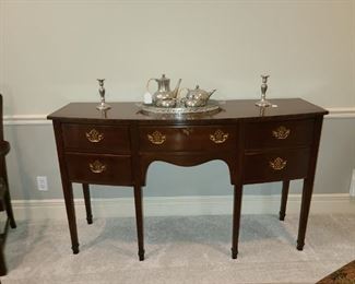 Harden credenza included with the black cherry table and chairs