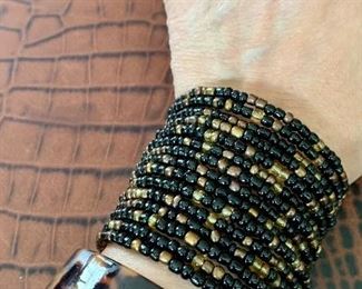 Item 78: Iridescent glass ring and (2) cuff bracelets: $28