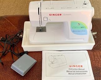 Item 129: Singer sewing machine: $125