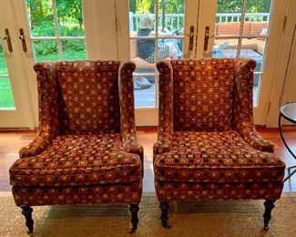 Item 88: (2) Wentworth Chairs from Lee Jofa featuring hand turned legs with brass casters - 27.5"l x 22"w x 33.5"h - some fading and wear to fabric: $375 ea