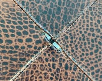 Small split to seam, dead center - top