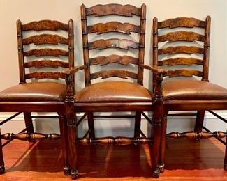 Item 122: Theodore Alexander Ladderback Chairs with Leather Seats: (2) chairs - 18.5"l x 15.5"w x 37.5"h: $250 (1) Arm chair - 22"l x 16.5"w x 41"h: $150
