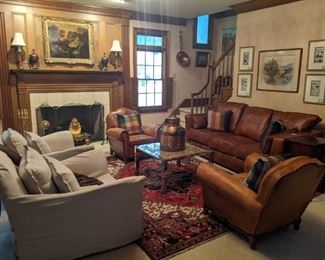 COZY den, with pair of Belgian linen "Justine Club Chairs", by Verellen, pair of 1920's French Deco leather armchairs, with brass tacks, contemporary chrome/granite coffee table, custom ordered leather sofa, from Leather Creations. 