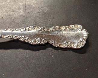 Detail of the "Louis XV" sterling silver pattern.