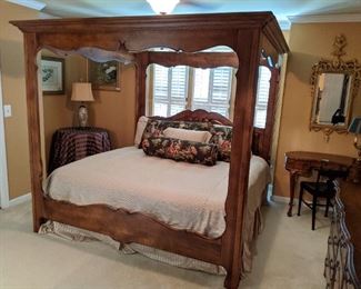 King size canopy bed, by Ethan Allen, with custom silk bed linens ($2K).