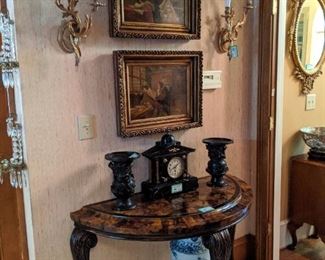 Pair of antique English oils on canvas, pair of Fredrick Cooper electrified 2-light wall sconces, faux tortoise shell demilune, by Maitland-Smith, vintage French marble mantle clock, pair of vintage Asian bronze vases, with dragon detail and large Asian blue/white porcelain vase.