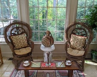 Pair of vintage wicker armchairs, white wicker elephant side table, Asian porcelain vase and pair of English porcelain teacups/saucers for a morning respite on the sunporch.