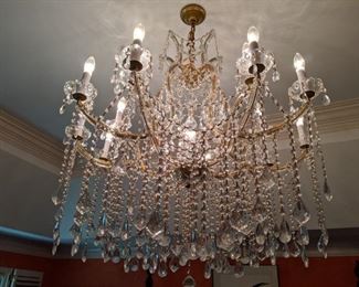 Ah, this is MUCH better! A 13-light Italian lead crystal Maria Theresa chandelier, one of two in the house. 