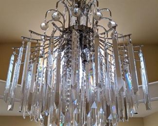 LOVE this watery, drippy Italian lead crystal 12-light chandelier in the master bathroom - off.