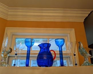 Cobalt blue glass, protected by Italian Murano glass roosters!