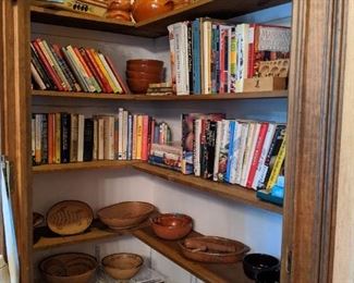 Cook's Book Nook! This woman LOVED to cook and entertain.                                                                                                 Yes, those are all cookbooks - you need!!              Collection of Mexican earthenware.