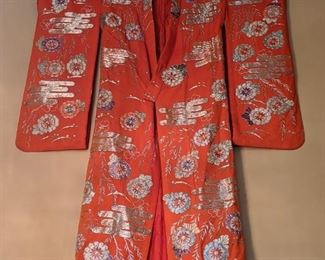 Antique silk Japanese kimono, from one of their trips, bought at an antique store and told that it was from the late 1800's, embroidered with gold thread; about 5' 3" long.
