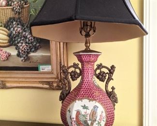 Asian porcelain table lamp, with bronze mounts, finial and silk shade.