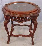 12 - Round Coffee Table w Lift Top Tray and Heads on Corner