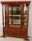 300 - Mahogany Empire Carved Glass China Cabinet with Acanthus carved collums, 2 drawers in base, 71in. Tall, 52in. Wide, 15in. Deep, ca 1880