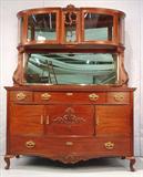 151 - Mahogany Sideboard with curved glass door and bevel mirror on top, 76 in. T, 60 in. W, 24 in. D, ca. 1890.