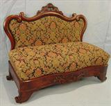 302 - Flamed Mahogany Empire Bustle Bench with green and black upholstery, carved back, 34 in. T, 42 in. W, 20 in. D, ca. 1850
