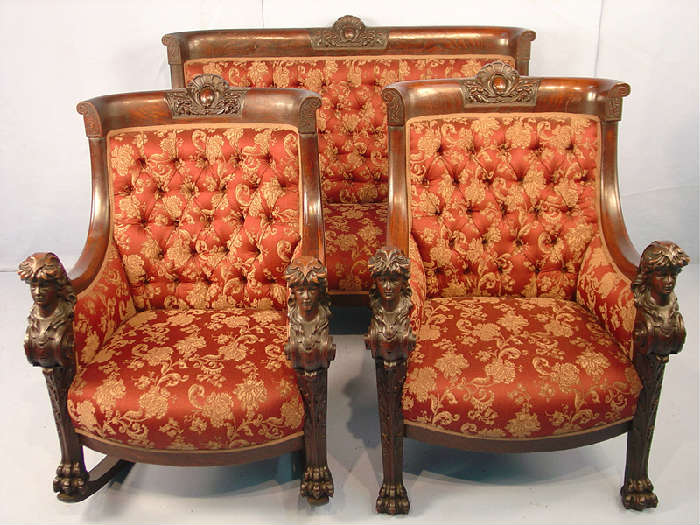 Oak R,J. Horner Parlor Suit with detail carving with head carved on arms, original finish, ca. 1890.
11 - Sofa from Parlor Suit - R.J. Horner, 44 in. T, 57 in. W, 34 in. D, ca. 1890.
12 - Rocker from Parlor Suit - R.J. Horner, 44 in. T, 29 in. W, 34 in. D, ca. 1890.
13 - Arm Chair from Parlor Suit - R.J. Horner, 44 in. T, 30 in. W, 33 in. D, ca. 1890.