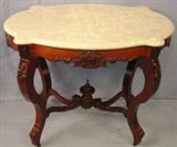 171 - Rare Walnut Victorian Turtle Top Table with original cast iron top, beautifully carved, 28 in. T, 37 in. W, 26 in. D, ca. 1860